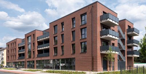 Frühzeitige Fertigstellung eines Wohn- und Geschäftshauses